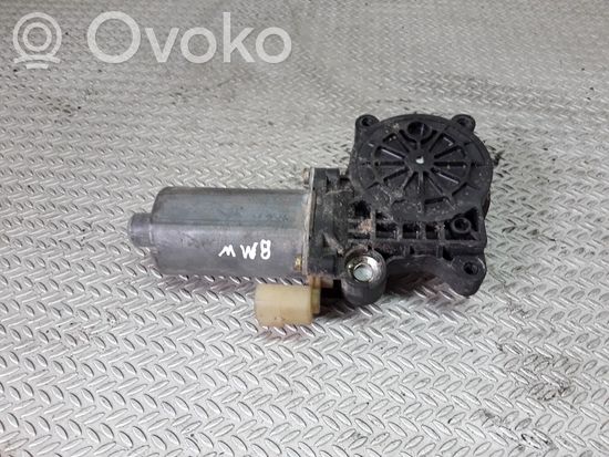 BMW 3 E46 Front door window regulator motor 0130821716