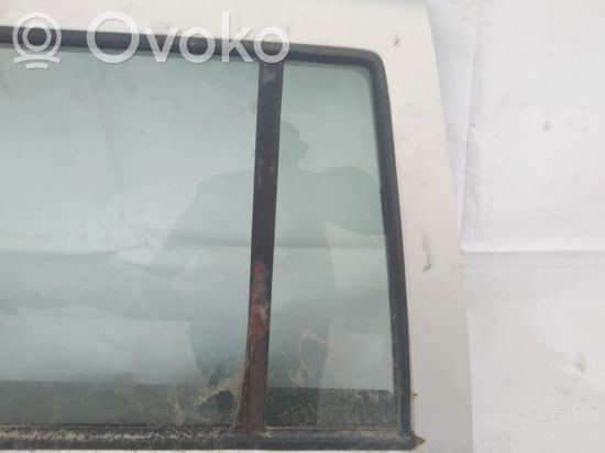 Volkswagen Golf IV Rear vent window glass