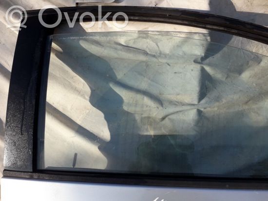 Volkswagen New Beetle Front door window glass four-door