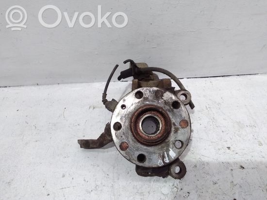 Volkswagen Touran I Front wheel hub spindle knuckle 1K06N