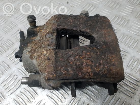 Volkswagen Golf IV Front brake caliper