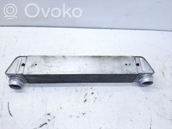 BMW 5 E60 E61 Intercooler radiator 779582301 F6438000