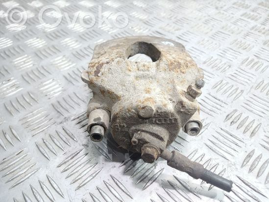Volkswagen Golf IV Front brake caliper