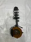 Front shock absorber with coil spring