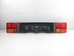 Trunk door license plate light bar