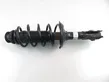 Front shock absorber with coil spring