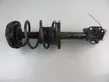 Front shock absorber with coil spring