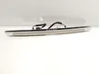 Trunk door license plate light bar