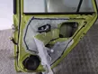 Rear door window regulator with motor