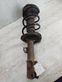 Front shock absorber with coil spring