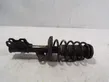 Front shock absorber with coil spring