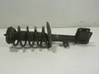 Front shock absorber with coil spring