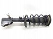 Front shock absorber with coil spring