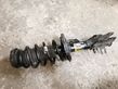 Front shock absorber with coil spring