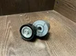 Timing belt tensioner