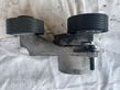 Alternator belt tensioner