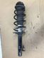 Front shock absorber with coil spring