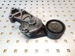 Alternator belt tensioner