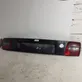 Trunk door license plate light bar