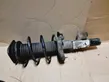 Front shock absorber with coil spring