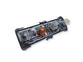 Tail light bulb cover holder