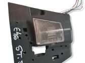 Tail light bulb cover holder