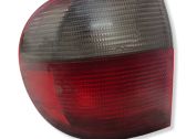 Tail light bulb cover holder