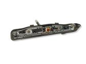 Tail light bulb cover holder