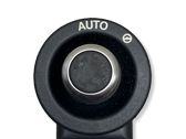 Steering wheel adjustment switch