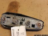 Tail light bulb cover holder
