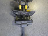 Front door check strap stopper