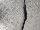 Front wiper blade arm