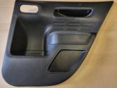 Coupe rear side trim panel