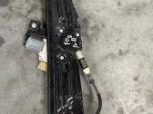 Rear door window regulator with motor
