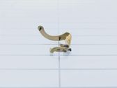 Sliding door check strap stopper