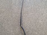 Front wiper blade arm