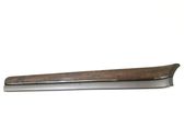 Front door trim bar