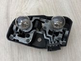 Tail light bulb cover holder