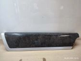 Rear door window switch trim