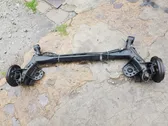 Rear axle beam with reductor