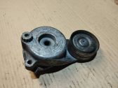 Alternator belt tensioner