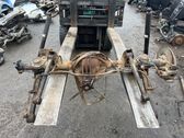 Rear axle beam with reductor