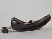 Timing belt/chain tensioner