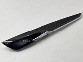 Front door trim bar