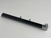 Front door trim bar