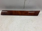 Front door trim bar