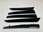 Front door trim bar