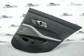 Rear door card panel trim