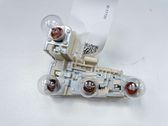 Tail light bulb cover holder