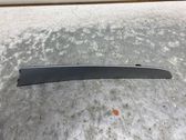 Front door trim bar